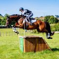 Sophie with Ben jumping cross country